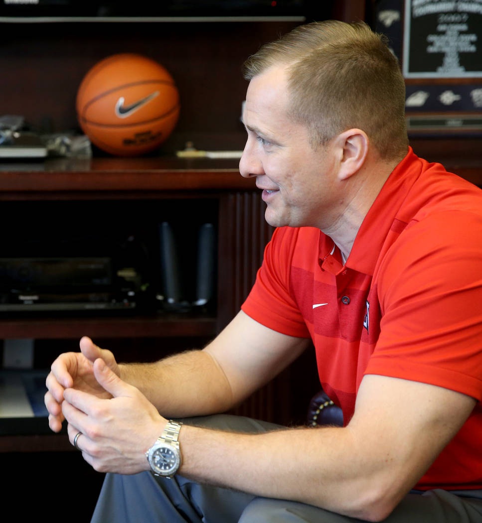 New UNLV basketball coach T.J. Otzelberger talks to a reporter in his office at the Thomas &amp ...