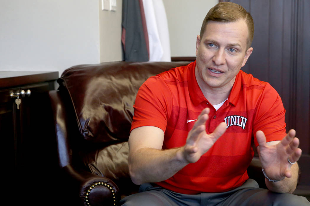 New UNLV basketball coach T.J. Otzelberger talks to a reporter in his office at the Thomas & ...