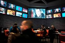 Patrons visit the sports betting area of Twin River Casino in Lincoln, R.I., on Jan. 28, 2019. ...