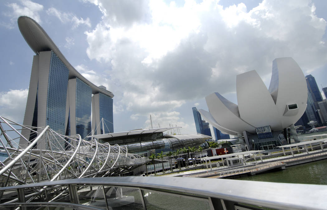 The Marina Bay Sands is seen against the financial skyline in Singapore, Feb. 17, 2011. (Wong M ...