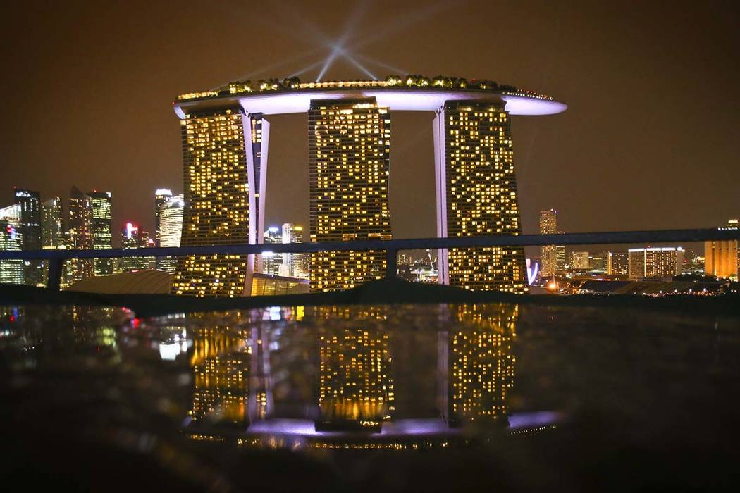 A reflection of Marina Bay Sands Singapore from a table at Gardens by the Bay, Dec. 13, 2012. T ...