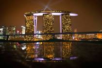 A reflection of Marina Bay Sands Singapore from a table at Gardens by the Bay, Dec. 13, 2012. T ...