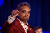Lori Lightfoot celebrates at her election night rally at the Hilton Chicago after defeating Ton ...