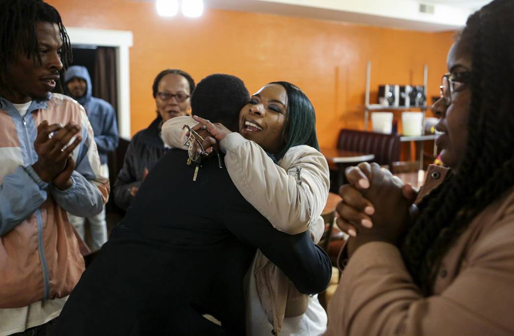 Michael Brown's mother Lesley McSpadden embraces her brother Courtney McSpadden during McSpadde ...
