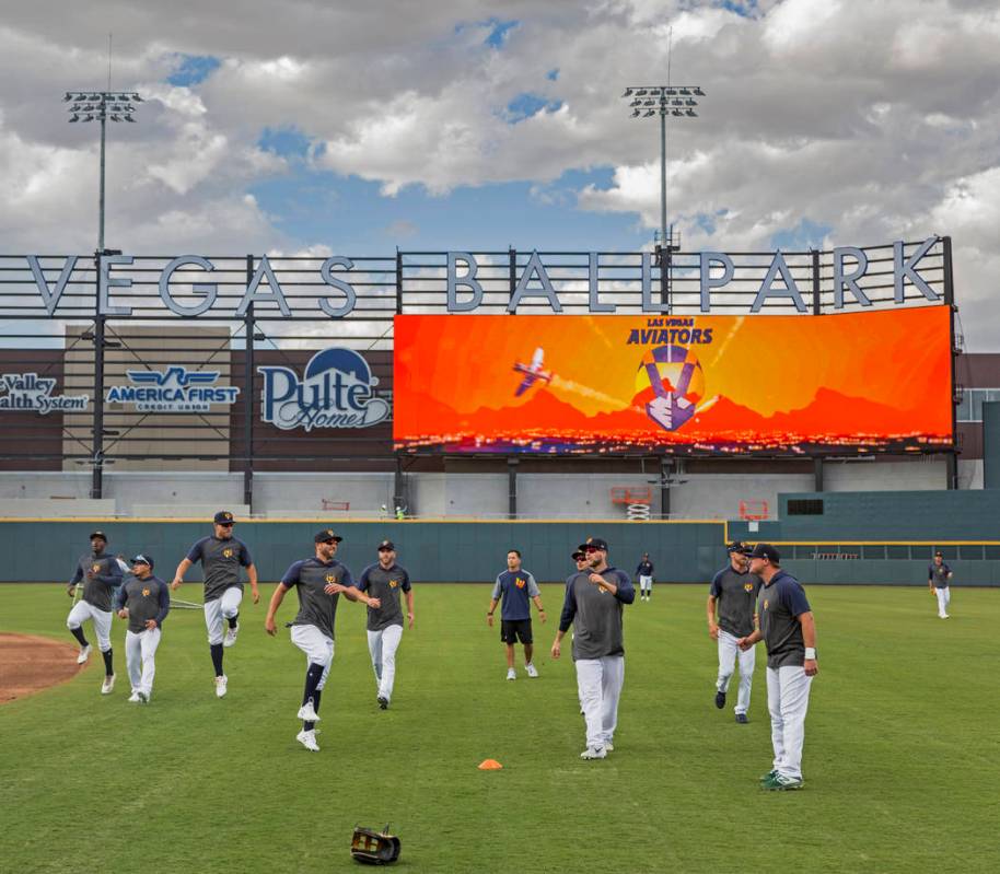 Aviators players warm up before the start of practice during media day at Las Vegas Ballpark on ...