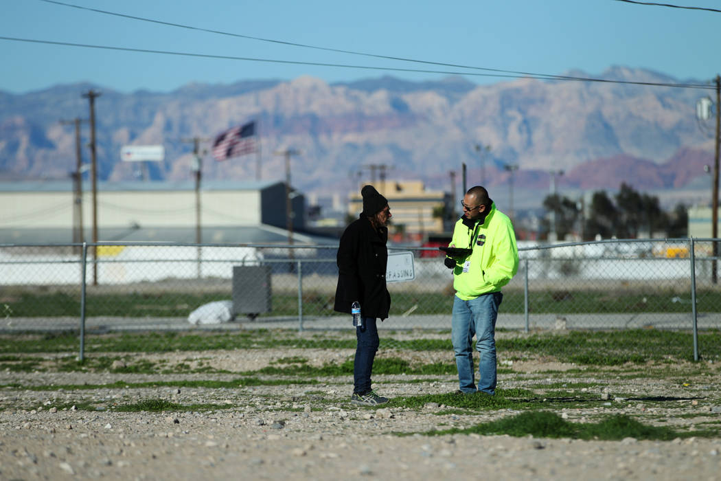 Homeless man Charles Whritenour, left, talks to Rafael Rodriguez-Aguayo, outreach case worker f ...
