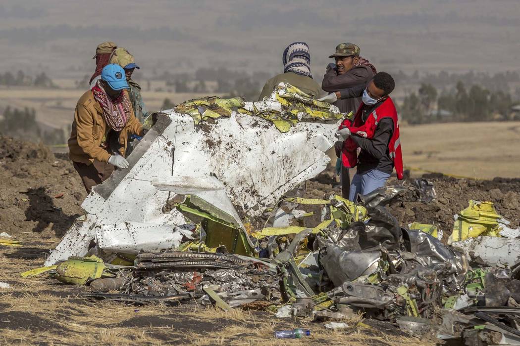 FILE - In this March 11, 2019, file photo, rescuers work at the scene of an Ethiopian Airlines ...
