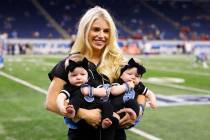 Kelly Stafford, wife of Detroit Lions quarterback Matthew Stafford holds the couple's twins Saw ...