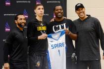 FILE - In this Nov. 9, 2018 file photo, LaMelo Ball, second from left, holds a Spire Institute ...