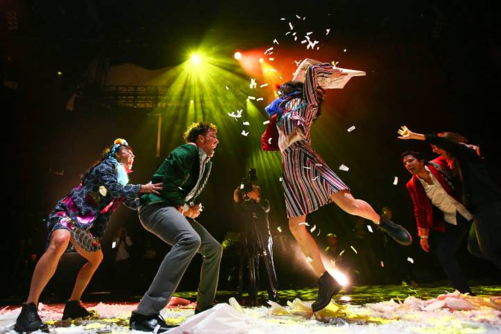 Cast members in "Fuerza Bruta" perform as part of a media preview at the show's tent ...