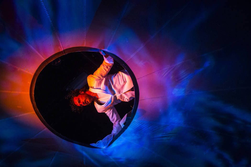 Cast members in "Fuerza Bruta" perform as part of a media preview at the show's tent ...