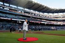 Former Atlanta Braves manager and Baseball Hall of Fame member Bobby Cox gives the command to & ...