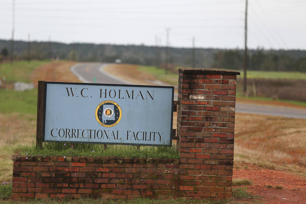 FILE -In this March 12, 2016 file photo, the sign to The William C. Holman Correctional Facilit ...