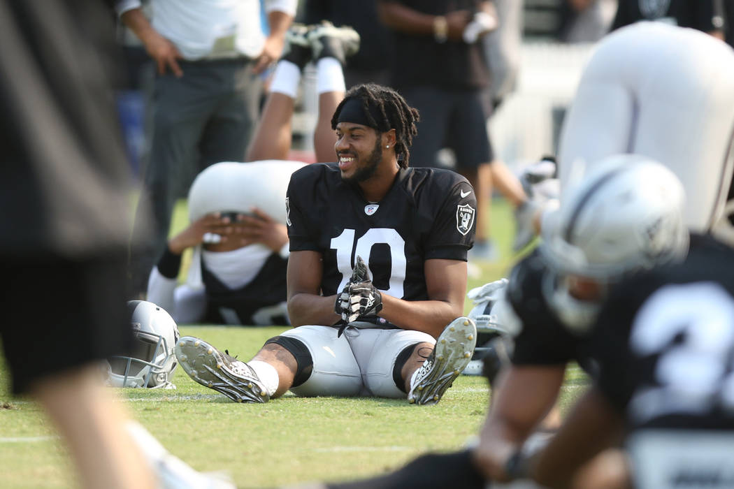 Oakland Raiders wide receiver Seth Roberts (10) warms up at the team's NFL training camp in Nap ...