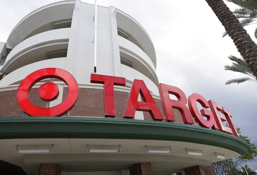 This Aug. 11, 2015 file photo shows a Target store in Miami. Target is raising the minimum hou ...