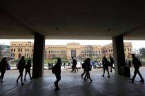 Students walk between classes at the University of Kansas on Monday, Nov. 16, 2015, in Lawrence ...