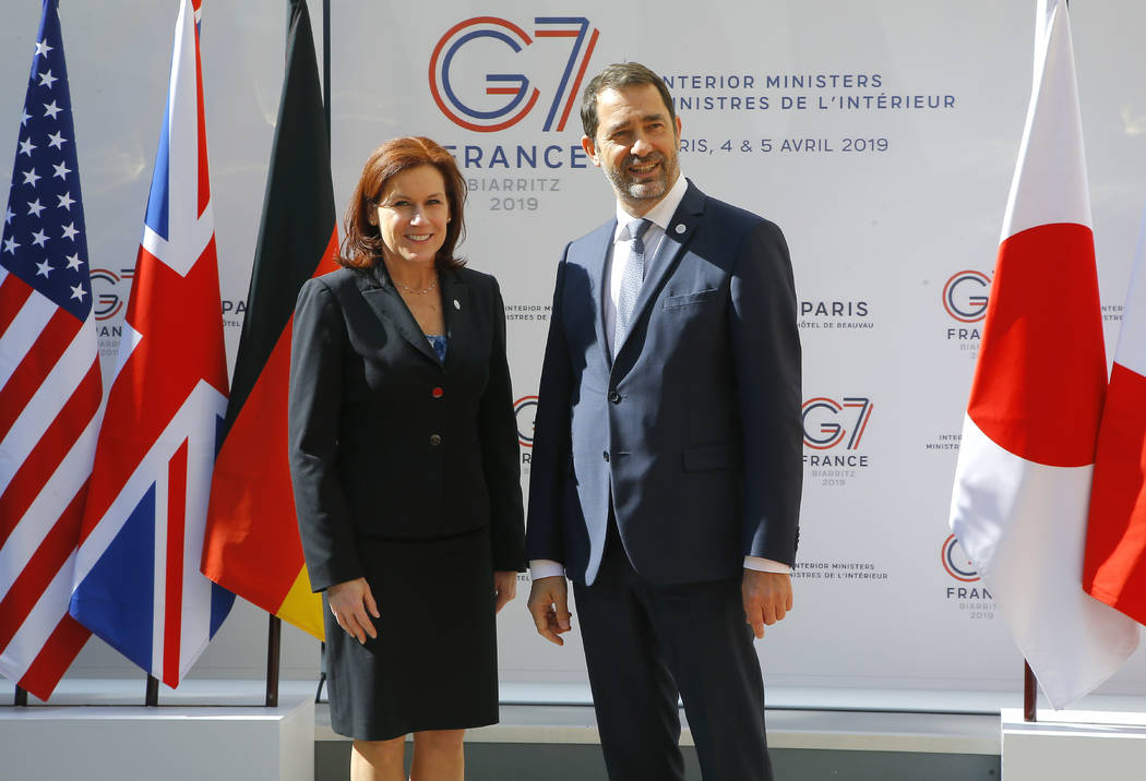 U.S. Homeland Security official Claire Grady, left, is welcomed by French Interior Minister Chr ...