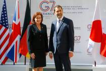 U.S. Homeland Security official Claire Grady, left, is welcomed by French Interior Minister Chr ...