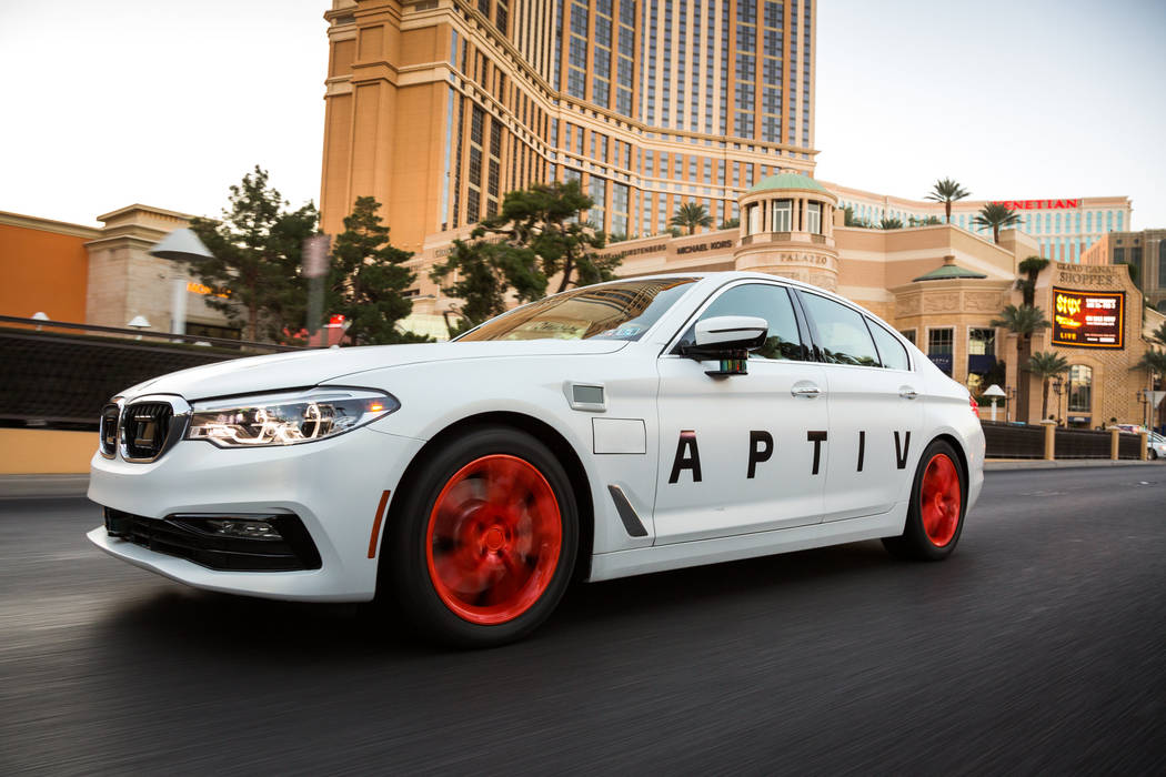 The APTIV vehicle with autonomous technology drives on the strip Friday, Dec. 1, 2017, in Las V ...