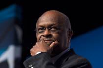 Herman Cain speaks during Faith and Freedom Coalition's Road to Majority event in Washington, F ...