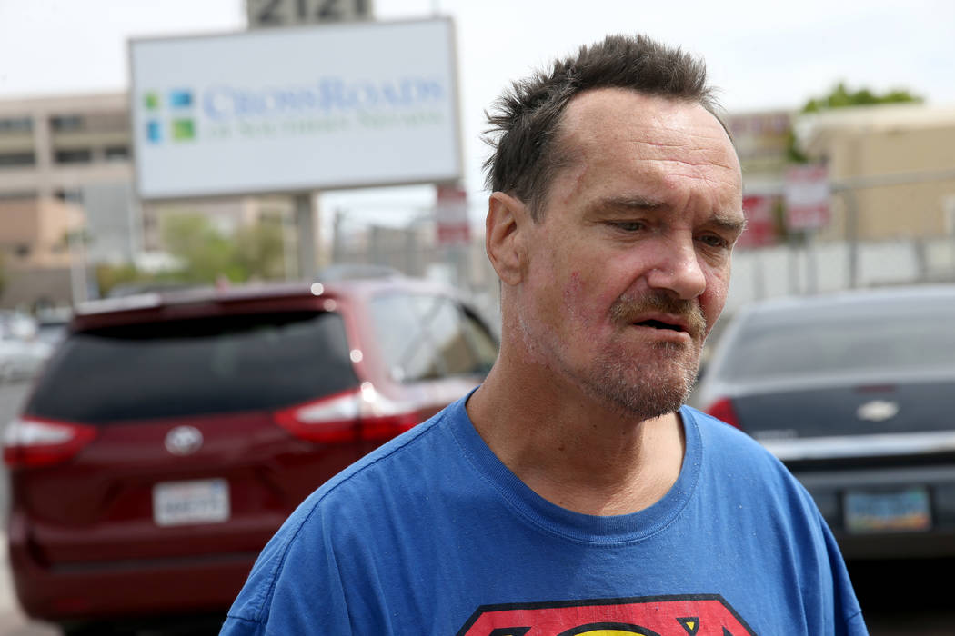Robert Claffey, 42, who was displaced from The New Hope Motel after a fire, talks to a reporter ...