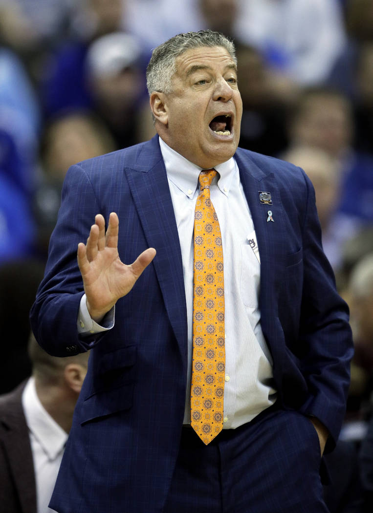 Auburn head coach Bruce Pearl yells from the sidelines during the first half of the Midwest Reg ...