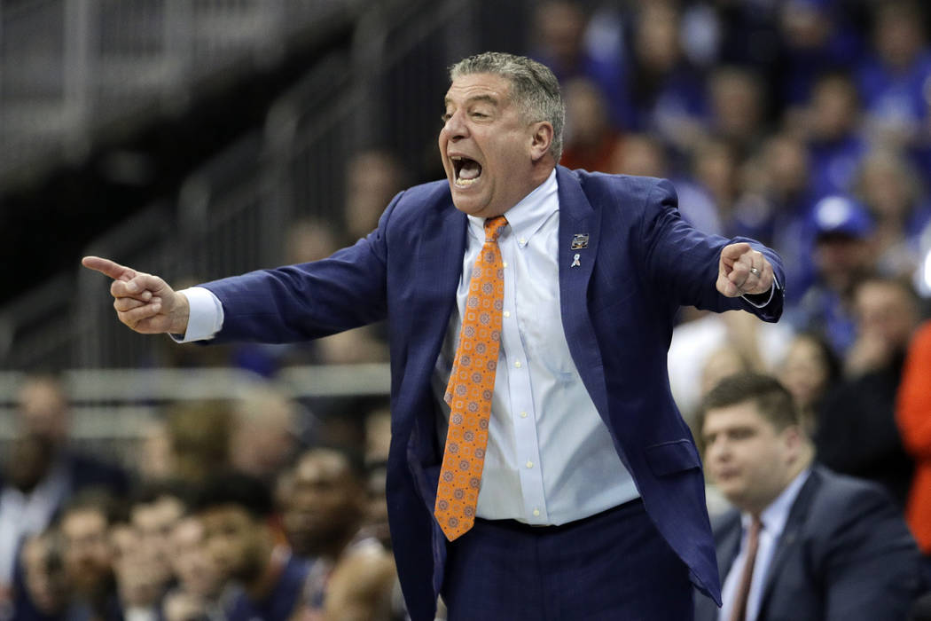 Auburn head coach Bruce Pearl yells from the sidelines during the first half of the Midwest Reg ...