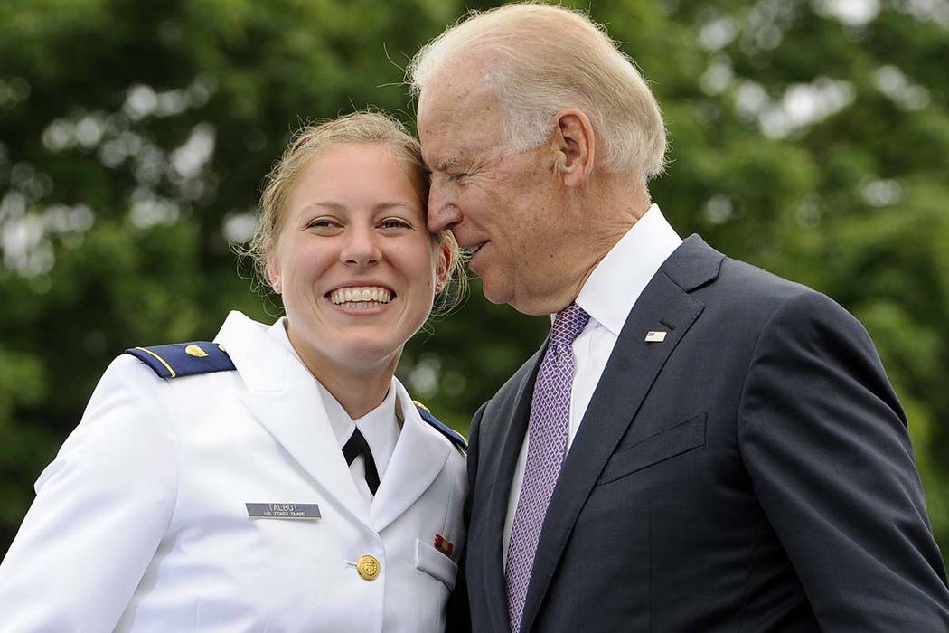 Newly commissioned officer Erin Talbot, left, poses for a photograph with Vice President Joe Bi ...