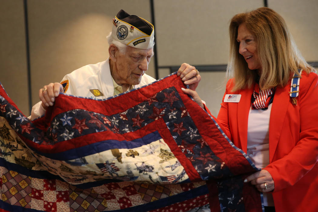 Pearl Harbor survivor Ed Hall with Montyne Connolly, vice regent for the Nevada State Societ ...
