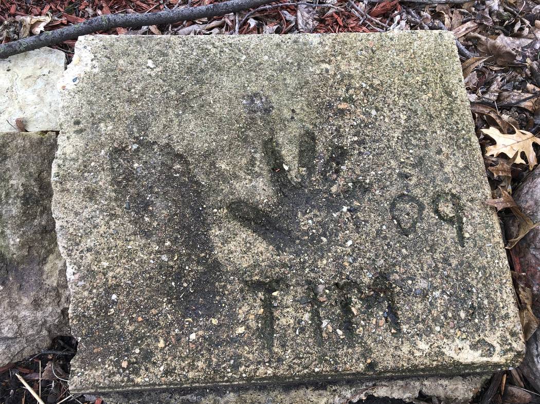 A slab of concrete sits in the backyard of the house where Timmothy Pitzen used to live in Auro ...