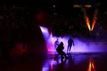 Golden Knights players skate onto the ice before the start of an NHL hockey game against the Ar ...