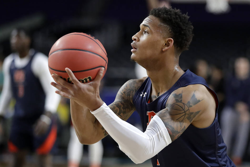 Auburn's Bryce Brown (2) warms up during a practice session for the semifinals of the Final Fou ...