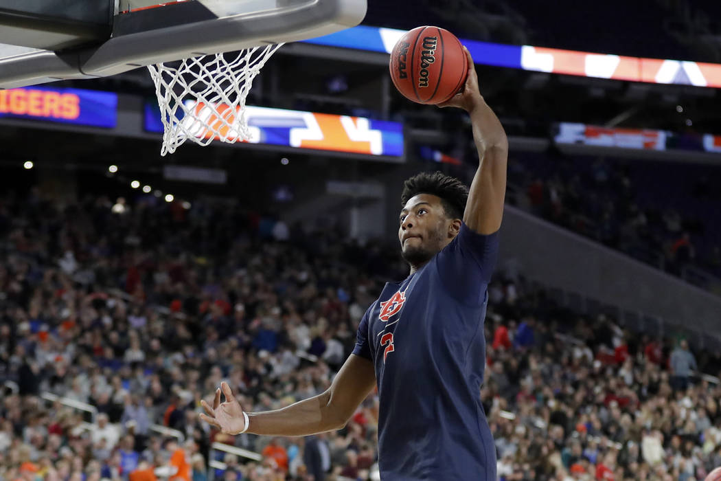Auburn's Bryce Brown (2) goes up for a shot during a practice session for the semifinals of the ...
