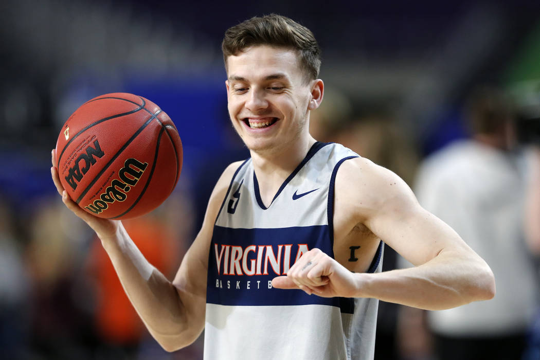 Virginia's Kyle Guy (5) dances around during a practice session for the semifinals of the Final ...