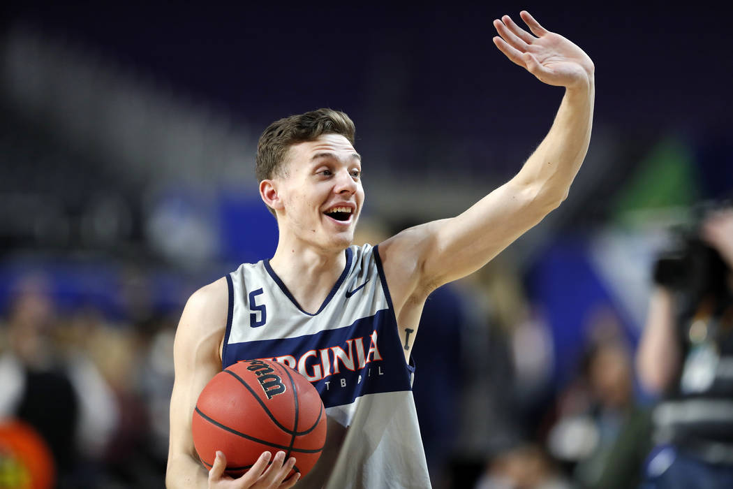 Virginia's Kyle Guy (5) dances around during a practice session for the semifinals of the Final ...