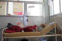 A man is treated for suspected cholera infection on March 28, 2019, at a hospital in Sanaa, Yem ...