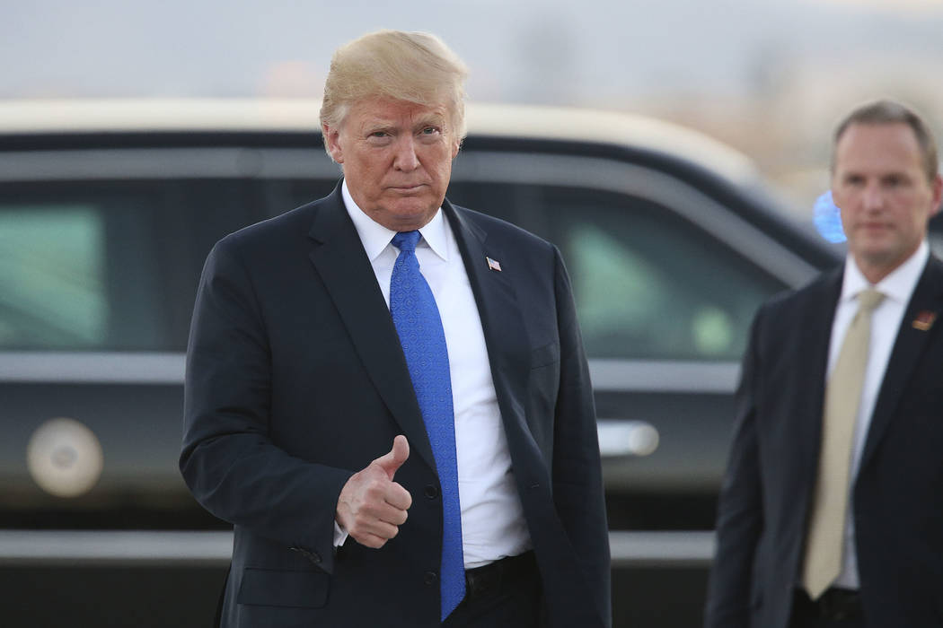 President Donald Trump arrives at McCarran International Airport in Las Vegas on Thursday, Sept ...