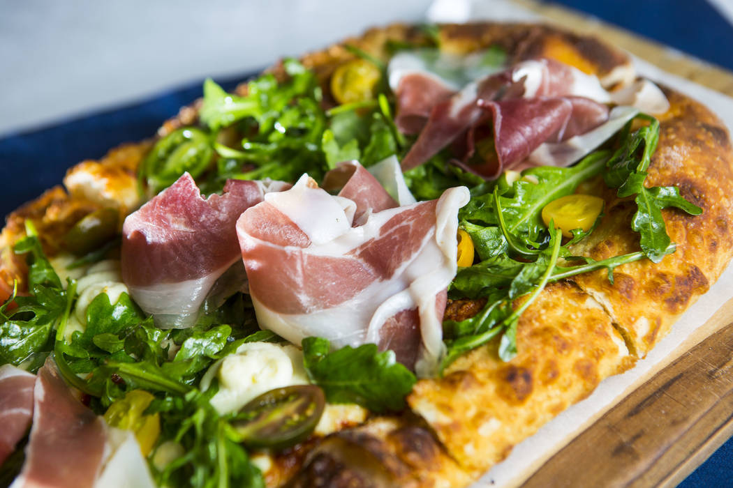 The Vegas Meets Italy pizza at Pizzeria Monzu, 6020 W. Flamingo Road, in Las Vegas. (Chase Stev ...