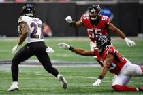 Atlanta Falcons' Jordan Richards (29) and Bruce Carter (55) defend against Baltimore Ravens cor ...