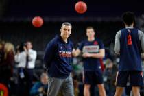 Virginia head coach Tony Bennett watches his team during a practice session for the semifinals ...