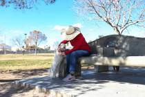Rimsen Doe picks up her dog, Kiki, at Woofter Family Park in Las Vegas, Wednesday, Feb. 27, 201 ...