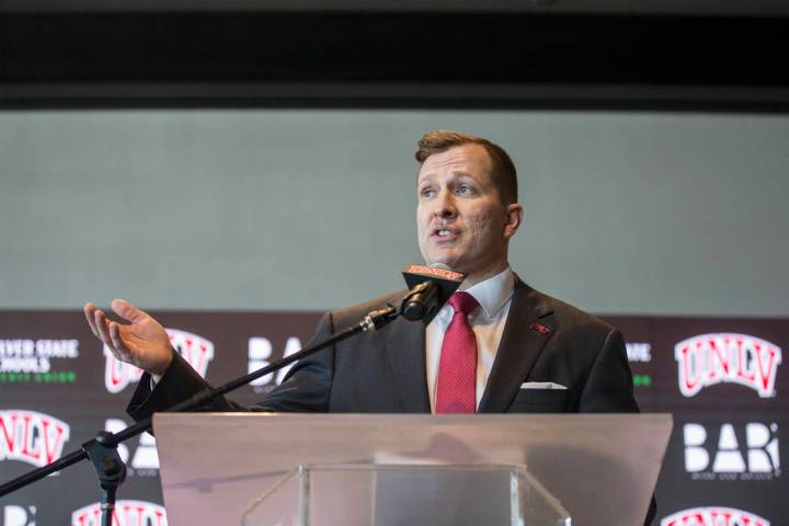 New UNLV men's basketball coach T.J. Otzelberger addresses the crowd at the Strip View Pavilion ...