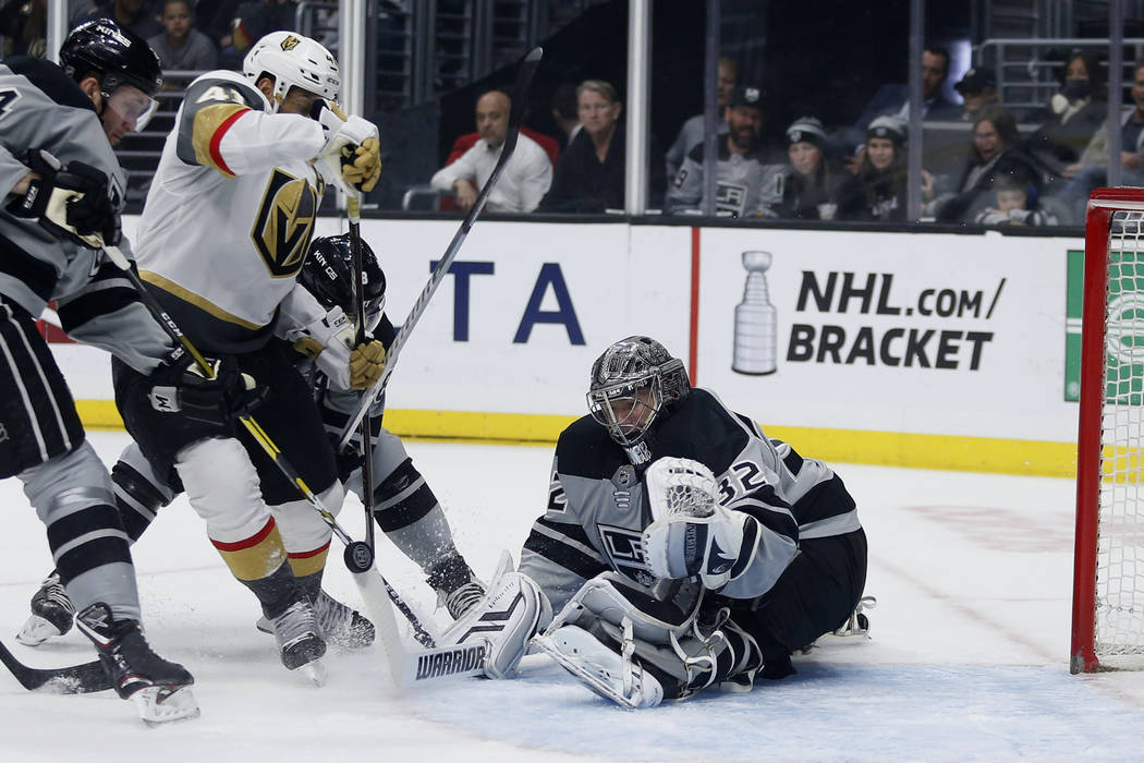 Los Angeles Kings goalie Jonathan Quick (32) stops a shot by Vegas Golden Knights forward Pierr ...