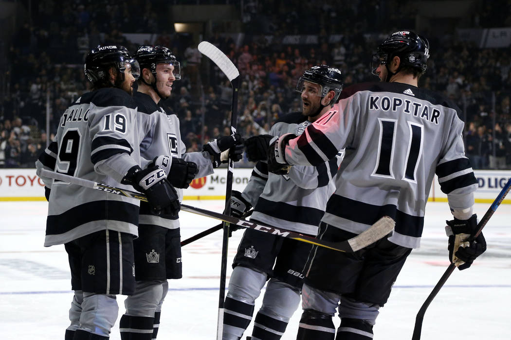 Los Angeles Kings forward Matt Roy. second from left, celebrates his goal with teammates during ...