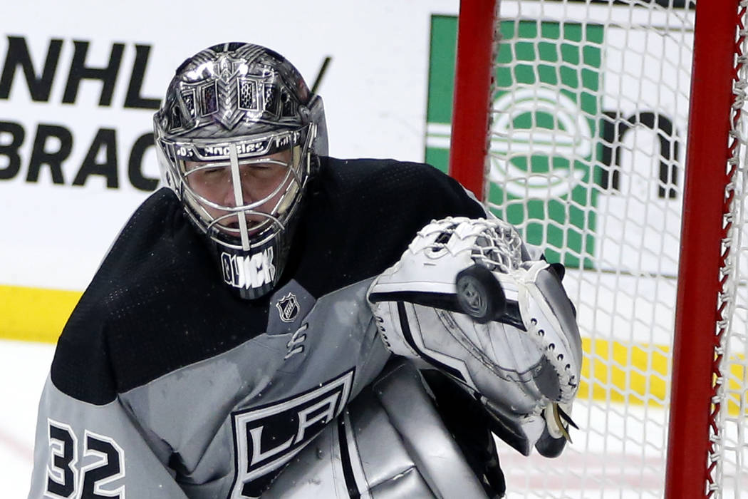 Los Angeles Kings goaltender Jonathan Quick makes a glove save on