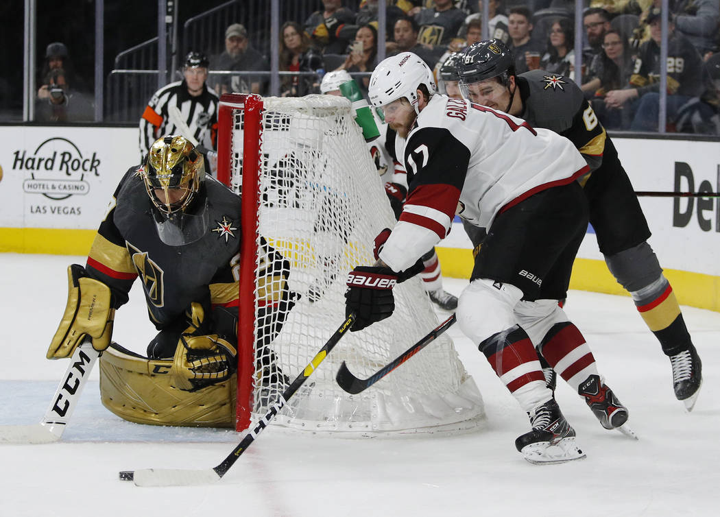 Arizona Coyotes center Alex Galchenyuk (17) attempts a wraparound shot against Vegas Golden Kni ...