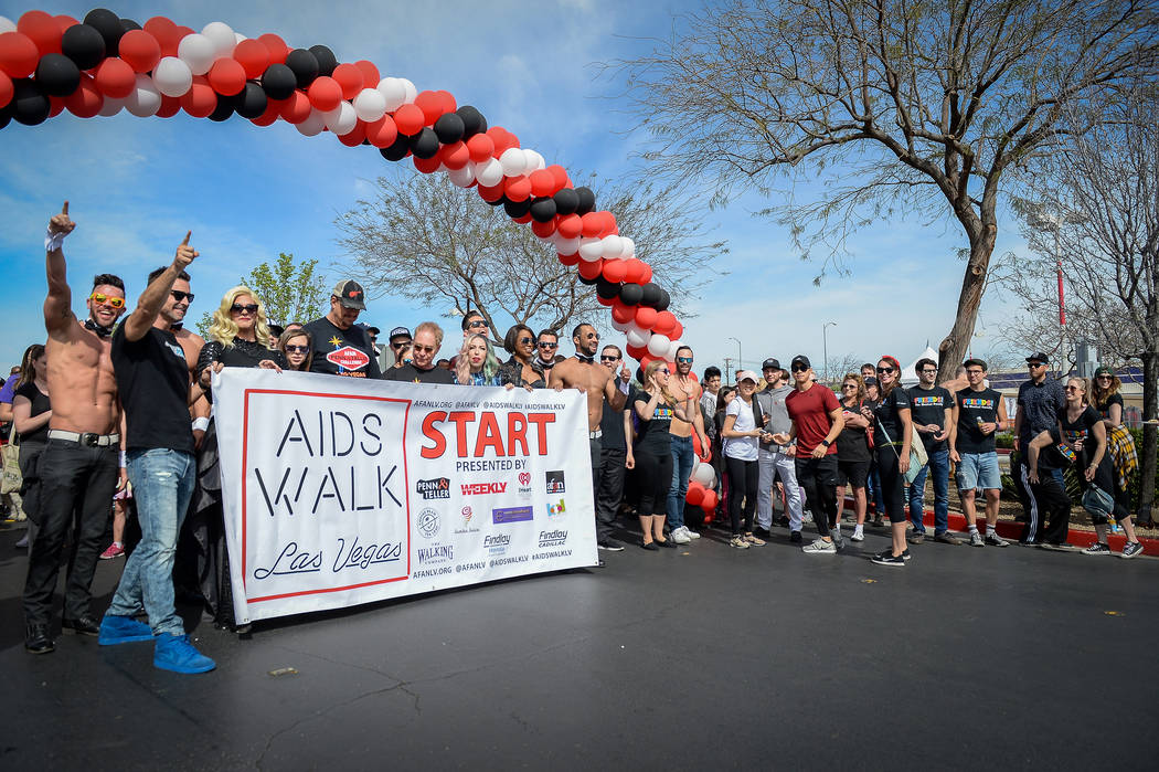 People participate in the 29th Annual AIDS Walk Las Vegas at Town Square in Las Vegas, Sunday, ...