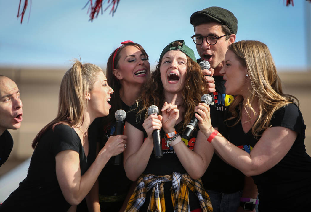 Cast members from Friends the Musical Parody sing on stage at the 29th Annual AIDS Walk Las Veg ...