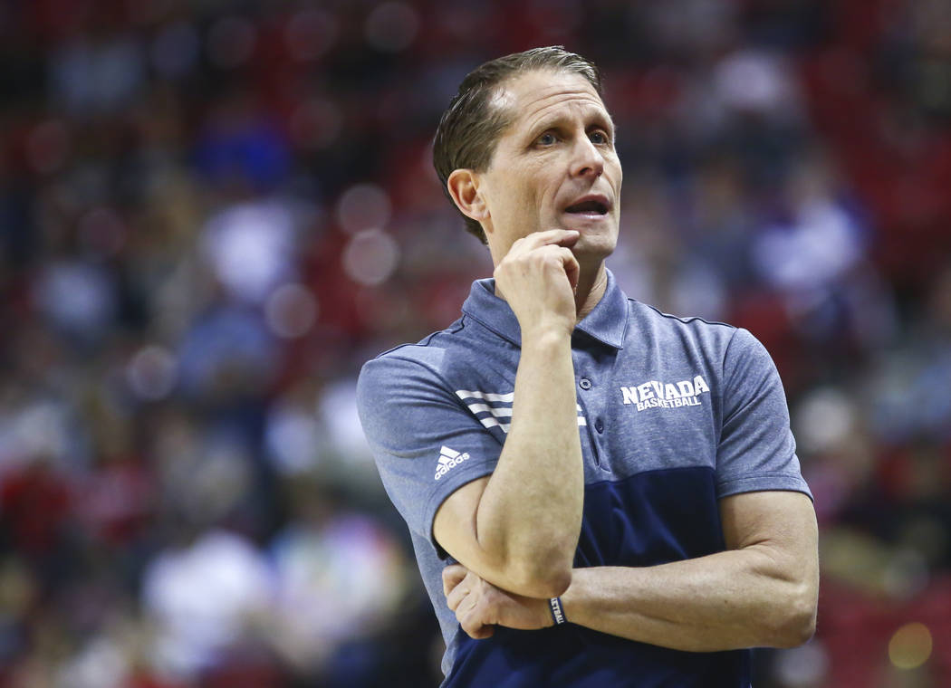 UNR Wolf Pack head coach Eric Musselman looks on during the first half of a semifinal basketbal ...