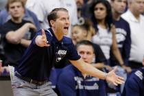 Nevada coach Eric Musselman yells instructions during the first half of a first round men's col ...
